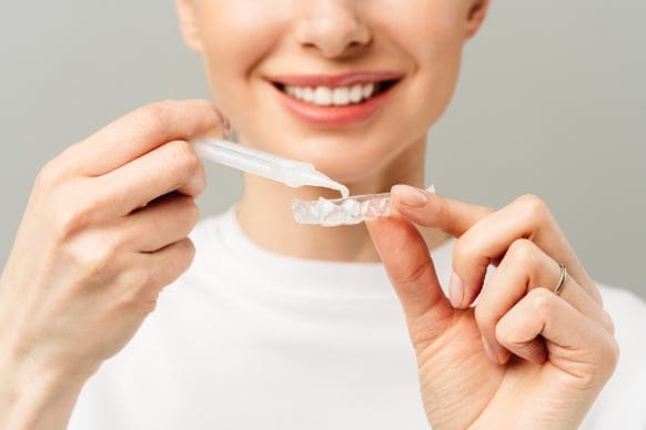 teeth whitening trays how they work cost and alternatives